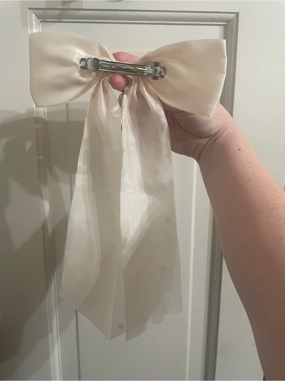 Pearl-Embellished Iridescent Ivory Bow Hair Clip